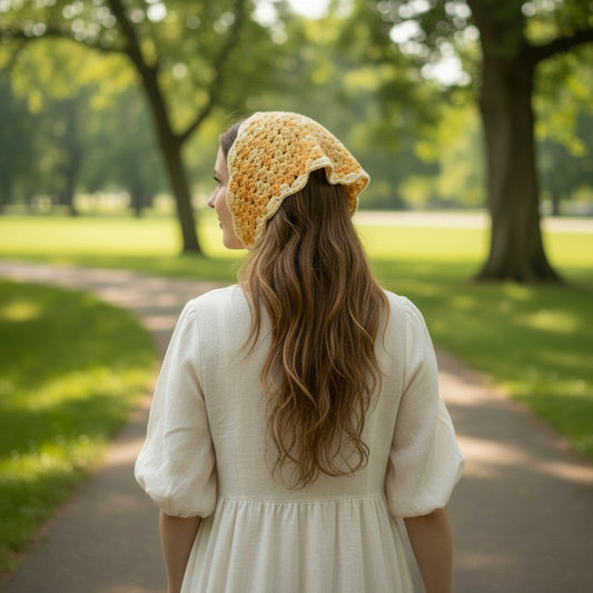 Crocheted bandana on a woman in the park yellow mutli color